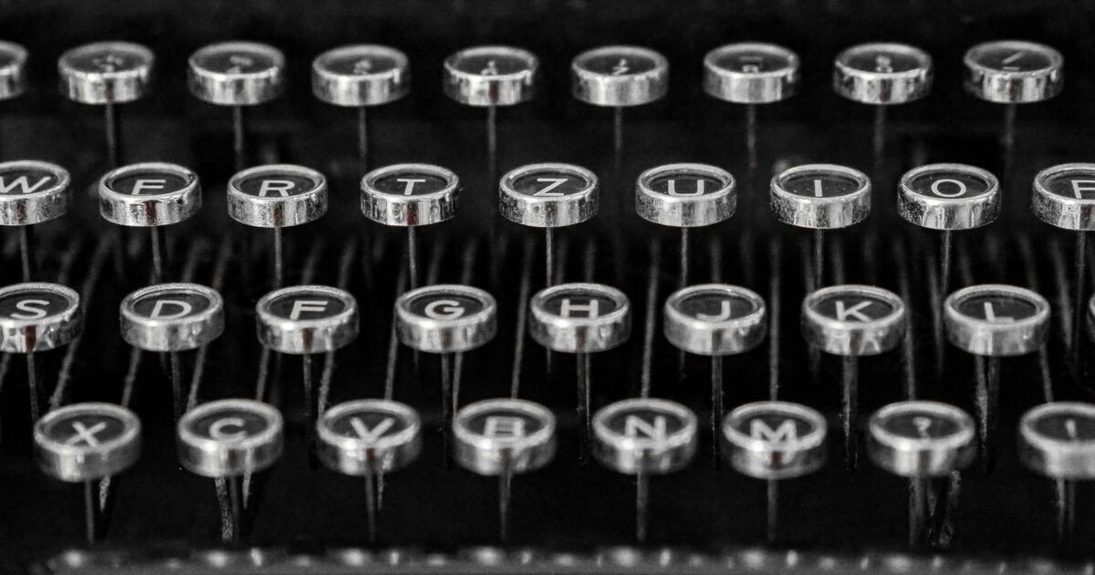 A close-up photo of typewriter keys.